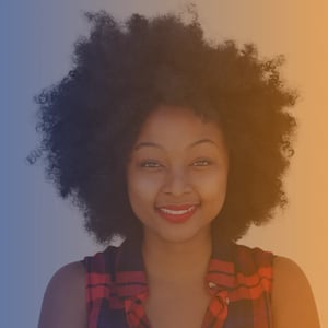 Early 30s black woman wearing black and read checked top
