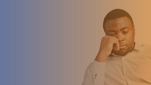 Black man in his late 30s looking upset