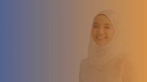 Mid 20s Muslim woman in white smiling