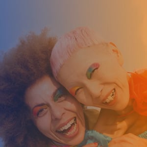 two people on gradient background